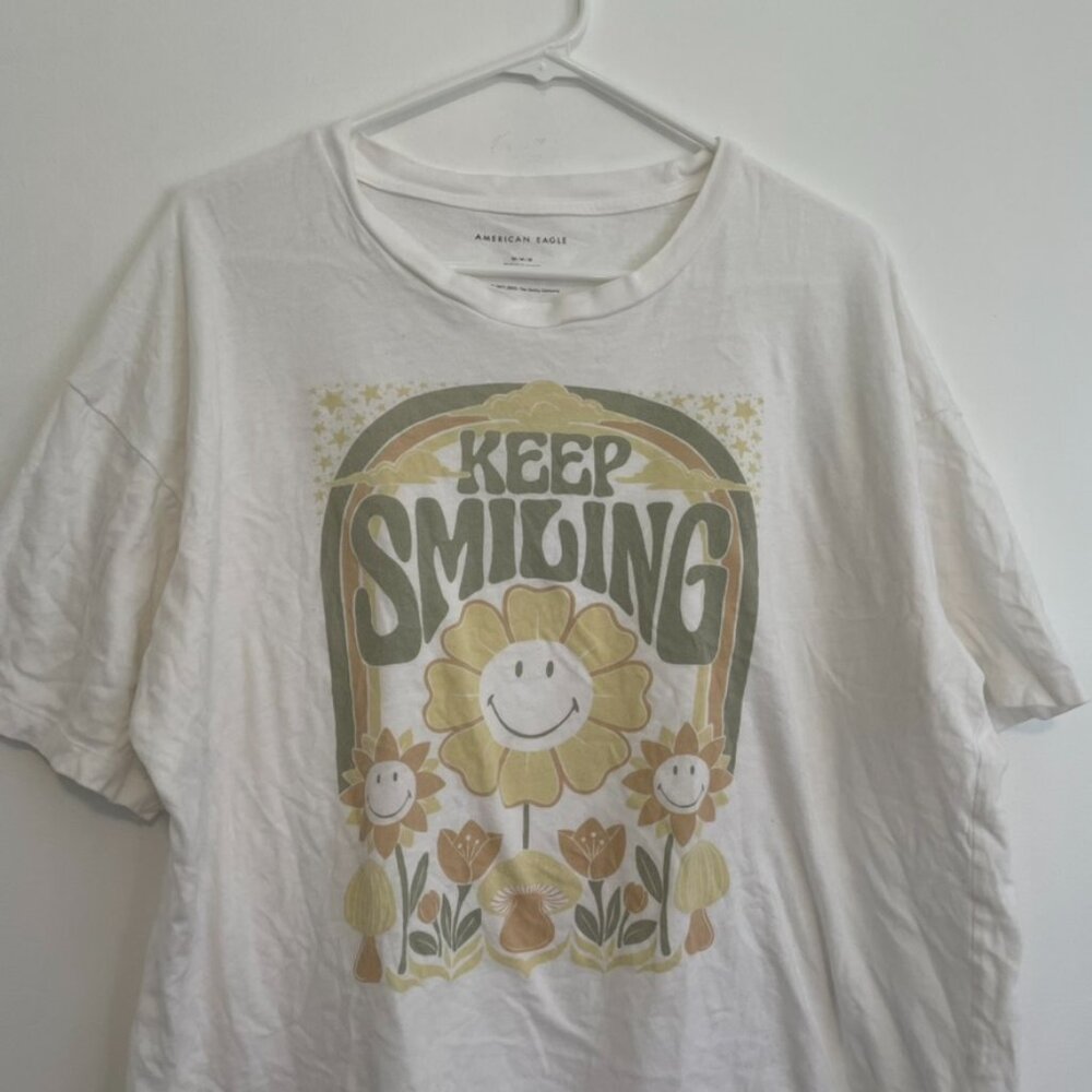 AMERICAN EAGLE Smiley Company Keep Smiling Oversized Graphic Tee White Floral M - Picture 4 of 16